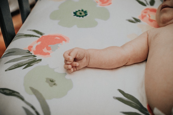 How to Safely Elevate a Crib Mattress 