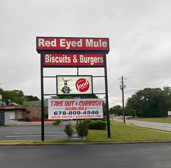 Exterior and sign for Red Eyed Mule